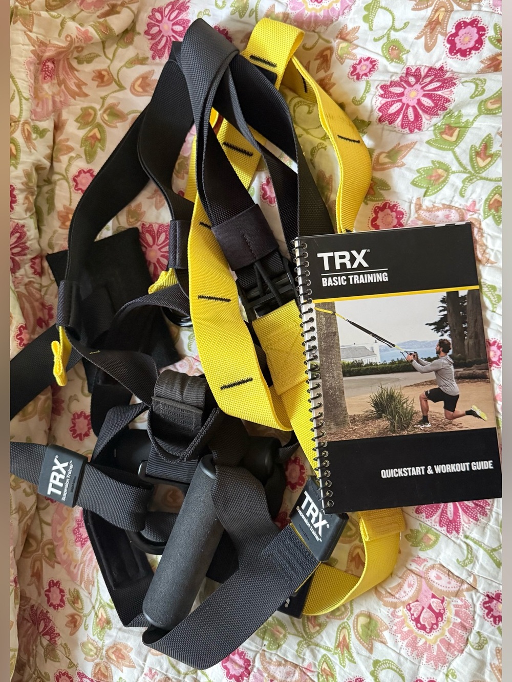 TRX Suspension Trainer Fitness Kit in Yellow and Black with instruction booklet